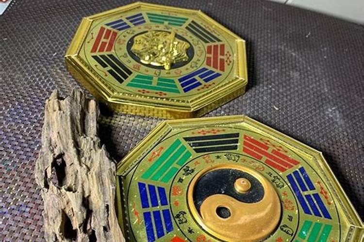 盘子里放八卦图和三个硬币,一根针,倒了些酒,用碗盖上埋在土里是什么意 ...